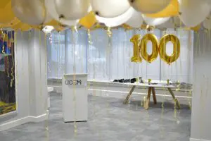 An empty Wells Suite with centenary balloons